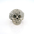 Sterling silver sugar skull ring with ornate filigree carved cranium, front view