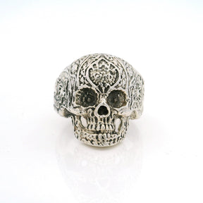 Sterling silver sugar skull ring with ornate filigree carved cranium, front view