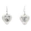 Sterling silver hollow puffed heart dangle earrings with a diamond-cut starburst pattern