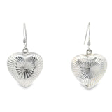 Sterling silver hollow puffed heart dangle earrings with a diamond-cut starburst pattern