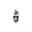 Sterling silver skull pendant with a branded A on the forehead, front view