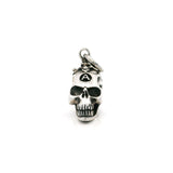 Sterling silver skull pendant with a branded A on the forehead, front view