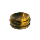 Golden brown chatoyant gemstone sphere stand disc with banded silky sheen and grooved sides