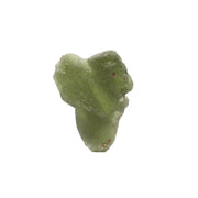 Raw moldavite tektite nugget with frosted sea glass texture and olive green color on white