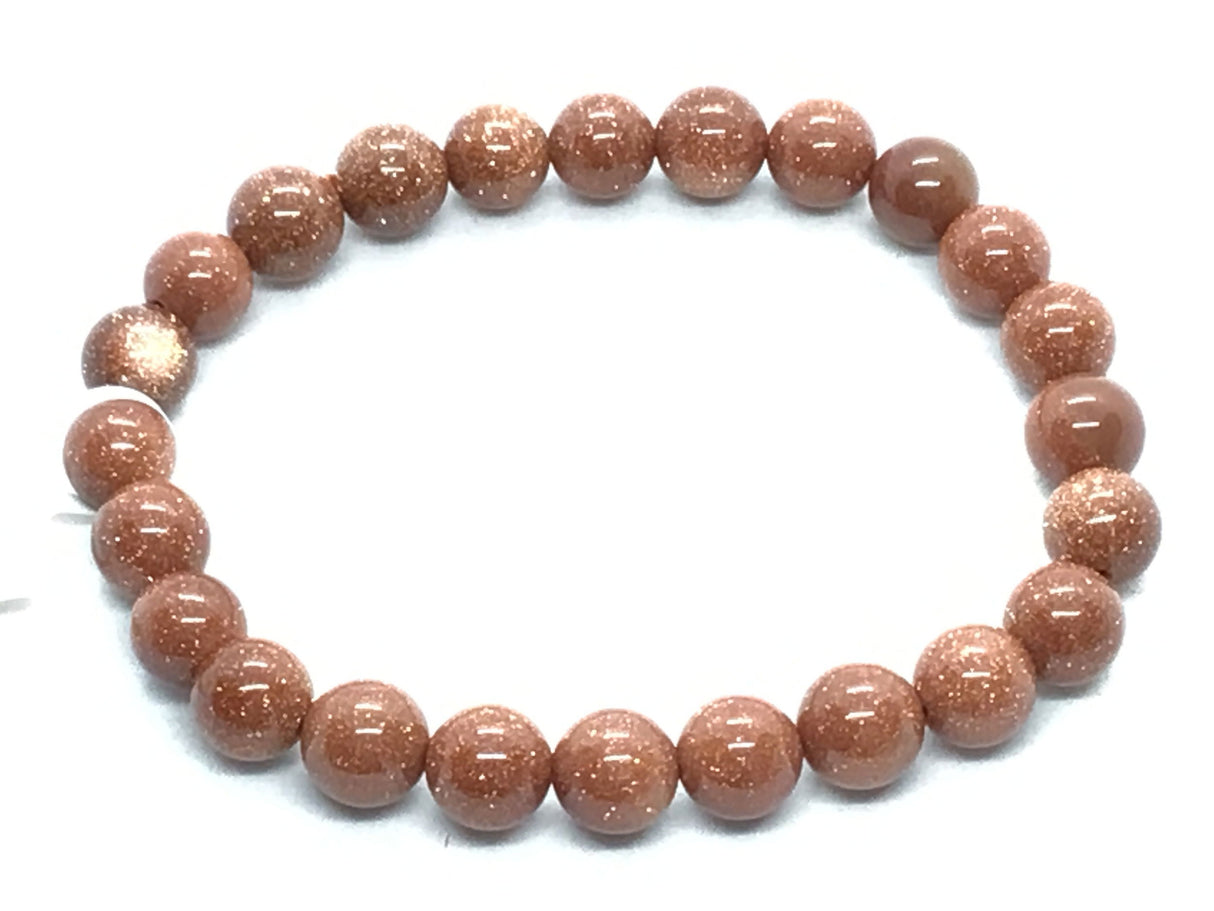 View of 8mm Round Red Goldstone Bracelet