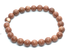 View of 8mm Round Red Goldstone Bracelet