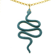 Turquoise nano crystal snake pendant with blue eyes on gold vermeil rolo chain