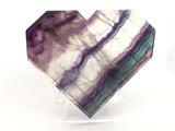Rainbow Fluorite Heart - Flat with Faceted Faces on Lucite Stand (Diagonal Purple & Green & Clear Banding with Green Along One Entire Edge)