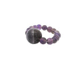 Amethyst beaded stretch ring in purple with a large round focal bead