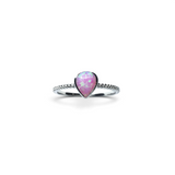 Rare Earth Gallery pear-shaped pink opal ring featuring a delicate textured silver band on a white background.