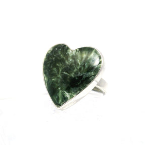 Green seraphinite heart cabochon with feathery silver chatoyance, bezel set