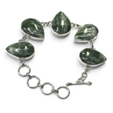 Rare Earth Gallery seraphinite link bracelet featuring five pear-shaped cabochons set in polished silver bezels.