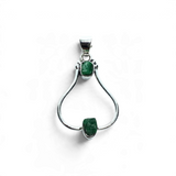 Rare Earth Gallery emerald pendant featuring two rough green freeform stones in 925 sterling silver open settings.