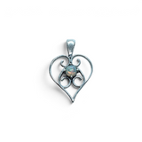 Rare Earth Gallery heart-shaped silver pendant featuring a round Ethiopian opal gemstone with intricate filigree.