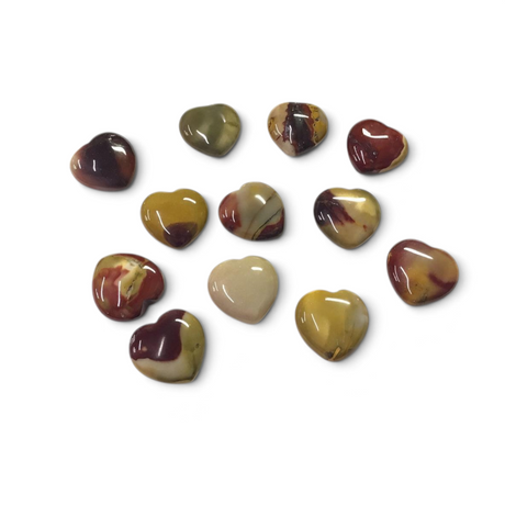 Rare Earth Gallery collection of polished Mookaite Jasper heart-shaped stones in various earthy red and yellow tones.