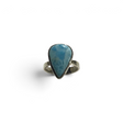Rare Earth Gallery pear-shaped blue larimar gemstone ring set in a simple sterling silver band.