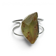 Rare Earth Gallery amber cuff bracelet featuring a rough freeform amber stone in a silver bezel on a double band