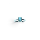 Rare Earth Gallery Larimar ring featuring a mini rectangular stone set in a polished silver bezel and band.