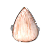 Peach scolecite pear cabochon ring with silver bezel, front view of striated stone