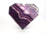 Rainbow Fluorite Heart - Flat with Faceted Faces on Lucite Stand (Diagonal Dark Purple Striping with Included Matrix at Tip)