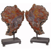 Pair of Arizona petrified wood slices mirrored like wings, red and purple grain, on separate metal stands