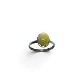 Rare Earth Gallery butterscotch amber mini oval ring in a simple silver setting, size 5.