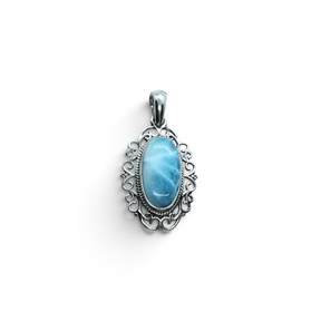 Rare Earth Gallery oval larimar cabochon pendant set in a 925 sterling silver bezel with intricate filigree edges.