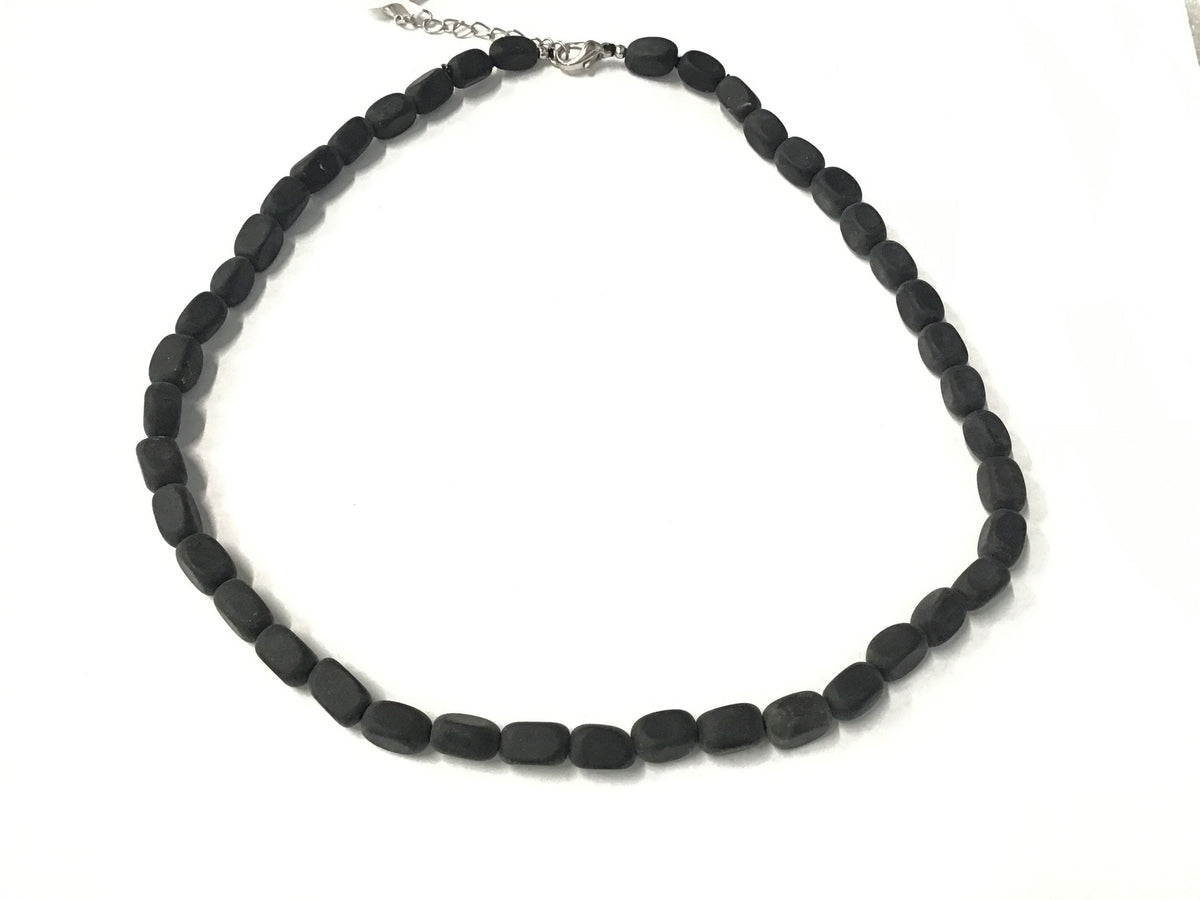 Matte black obsidian rectangle tumbled bead necklace with silver lobster clasp and extender.