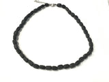 Matte black obsidian rectangle tumbled bead necklace with silver lobster clasp and extender.