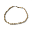 Rare Earth Gallery necklace featuring smooth, rectangular tumbled petrified wood beads in earthy beige tones.