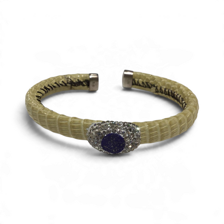 Rare Earth Gallery snake skin cuff bracelet featuring a central lapis lazuli stone surrounded by sparkling marcasite.
