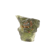 Raw Moldavite tektite nugget, sage-green glass with rust-colored inclusions on white