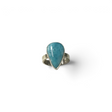 Rare Earth Gallery larimar ring featuring a large pear-shaped cabochon stone in a raised silver bezel setting