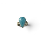 Rare Earth Gallery larimar ring featuring a large pear-shaped cabochon stone in a raised silver bezel setting