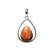 Sunstone pear cabochon pendant in open sterling silver teardrop frame