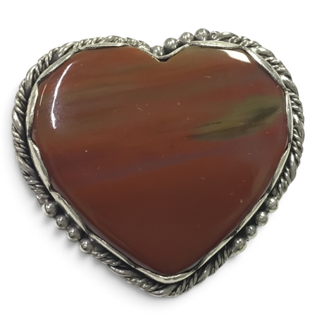 Rare Earth Gallery heart-shaped Arizona petrified wood ring with a decorative silver rope and beaded bezel setting.