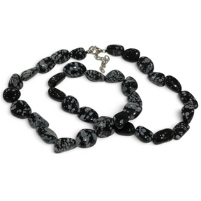 Rare Earth Gallery tumbled snowflake obsidian necklace featuring polished black and grey patterned gemstone beads.