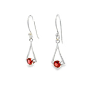 Round faceted garnet dangle earrings prong set on open tapered sterling silver kite frames