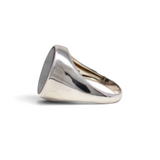 Polished sterling silver labradorite signet ring shown from the side profile