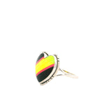 Multi color opal inlaid heart ring, side view of black, yellow-green and pink stripes on a split silver band