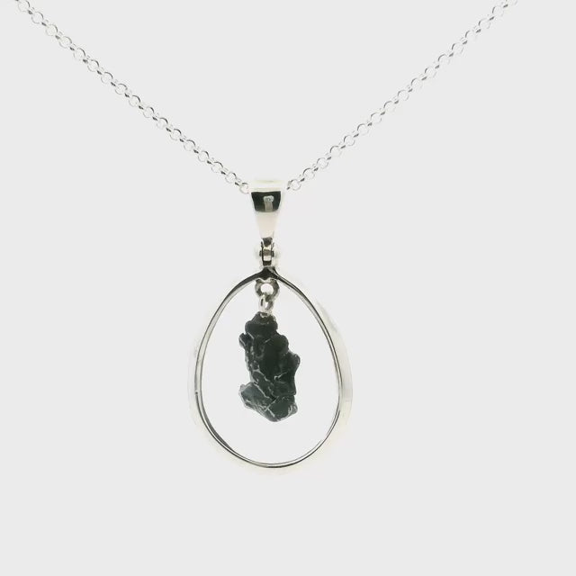 Campo De Cielo Meteorite Pendant - Rough J-Shaped Speciman Hanging in Open Oval with 925 Sterling Silver with Chain