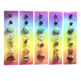 Rare Earth Gallery 7 Chakra magnet set featuring raw crystals including amethyst, sodalite, amazonite, and rose quartz.