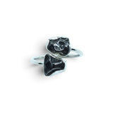 Rare Earth Gallery Agoudal meteorite ring featuring two bezel-set cosmic nuggets on an adjustable open silver band.