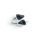 Rare Earth Gallery Agoudal meteorite ring featuring two bezel-set black cosmic nuggets on a polished silver open band.