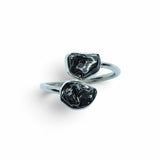 Rare Earth Gallery Agoudal meteorite ring featuring two bezel-set dark cosmic nuggets on a polished silver open band.