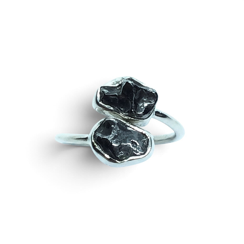 Rare Earth Gallery Agoudal meteorite ring with two bezel-set cosmic nuggets on an adjustable open silver band