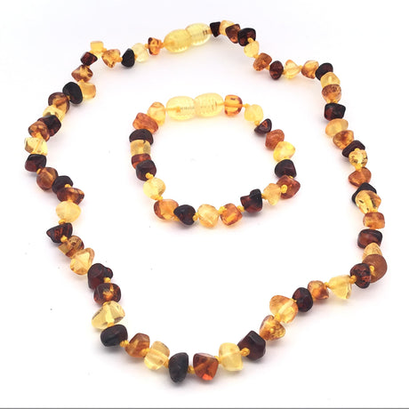 Rare Earth Gallery Mix Amber Baby Set - Necklace & Bracelet with Screw Clasp. Genuine amber beads in honey, cognac, and butterscotch tones.
