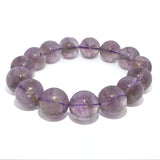 Rare Earth Gallery Ametrine beaded bracelet with 13.5-14.5 mm round beads in purple and yellow hues.