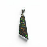 Rare Earth Gallery organic ammolite pendant featuring iridescent green, blue, and amber fossilized shell in silver setting
