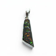 Rare Earth Gallery organic ammolite pendant featuring iridescent green, blue, and amber fossilized shell in silver setting